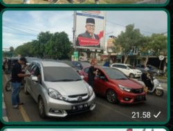 Relawan DPD PNBN Aceh Bagikan Bendera Merah Putih Pada Pengguna Jalan